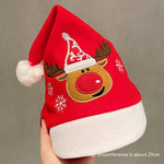 Sjov julehue i plys med festlige designs