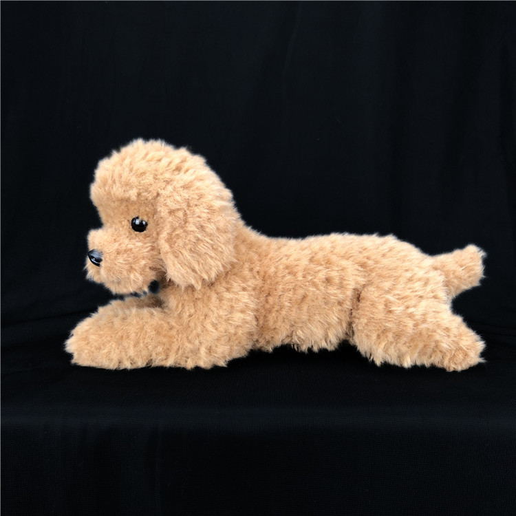 Teddyhund i plys, siddende eller liggende