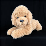 Teddyhund i plys, siddende eller liggende