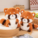 Jolie peluche raton laveur