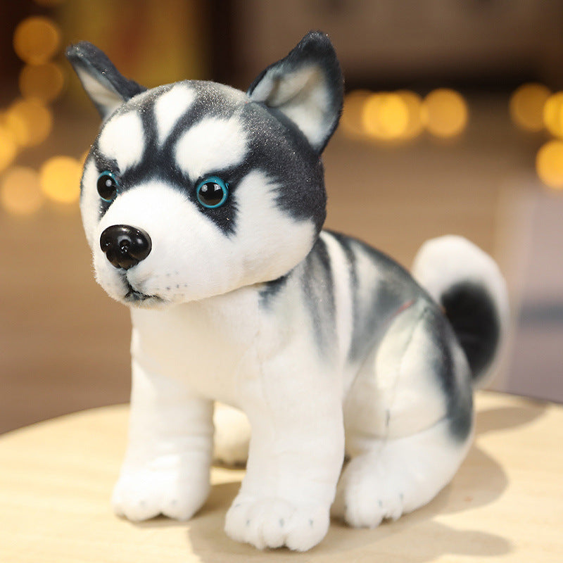Cachorro de peluche adorable sentado o de pie