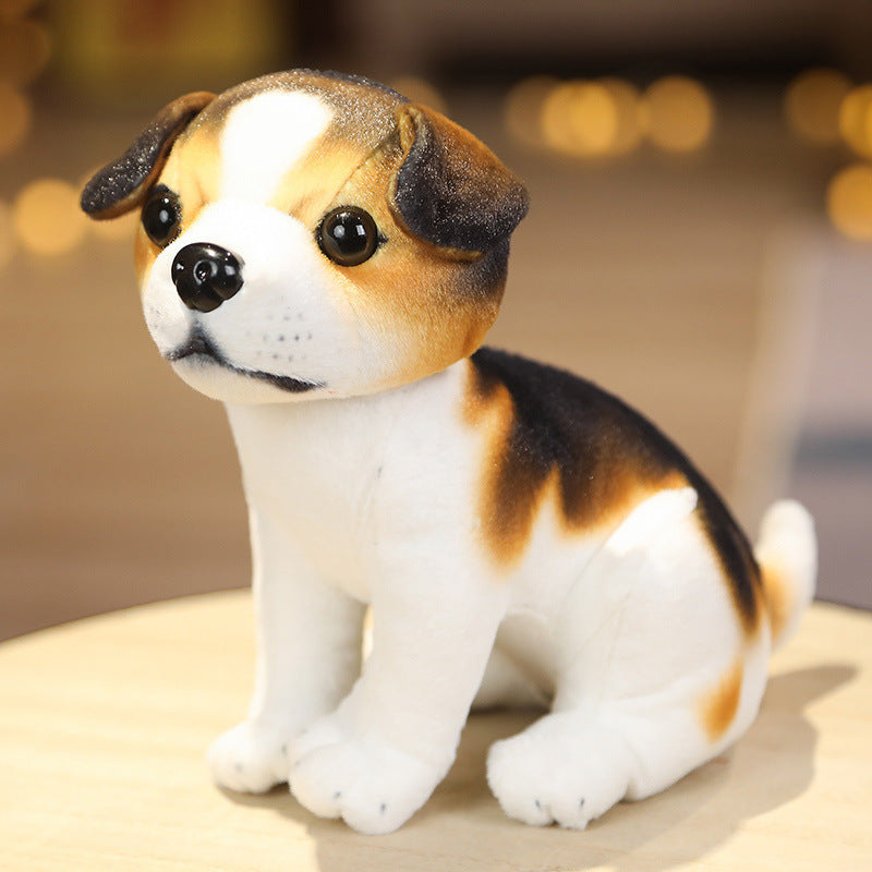 Cachorro de peluche adorable sentado o de pie