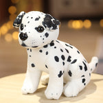 Cucciolo di peluche in posa seduta o in piedi