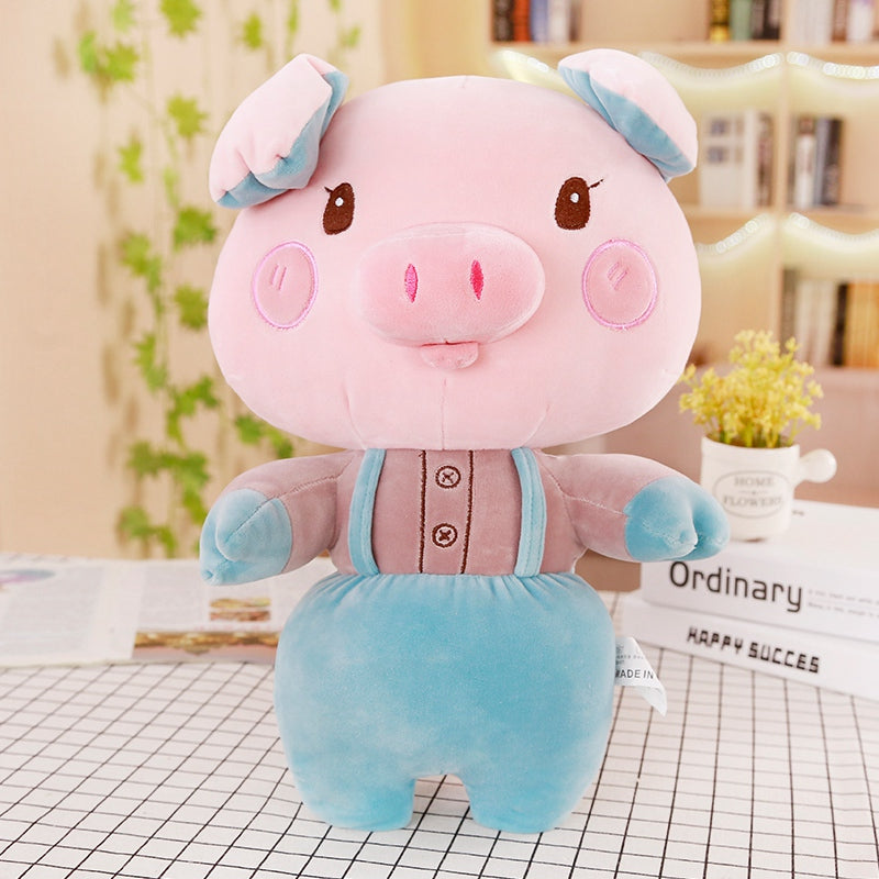 Cuscino maialino di peluche con salopette