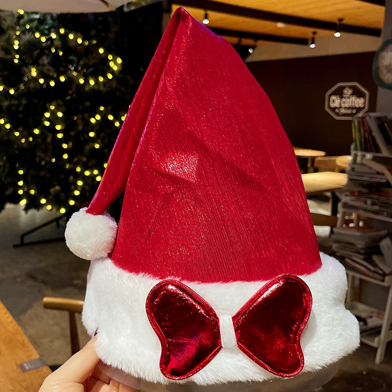Sjov julehue i plys med festlige designs