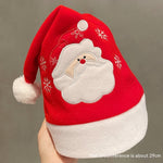 Sjov julehue i plys med festlige designs