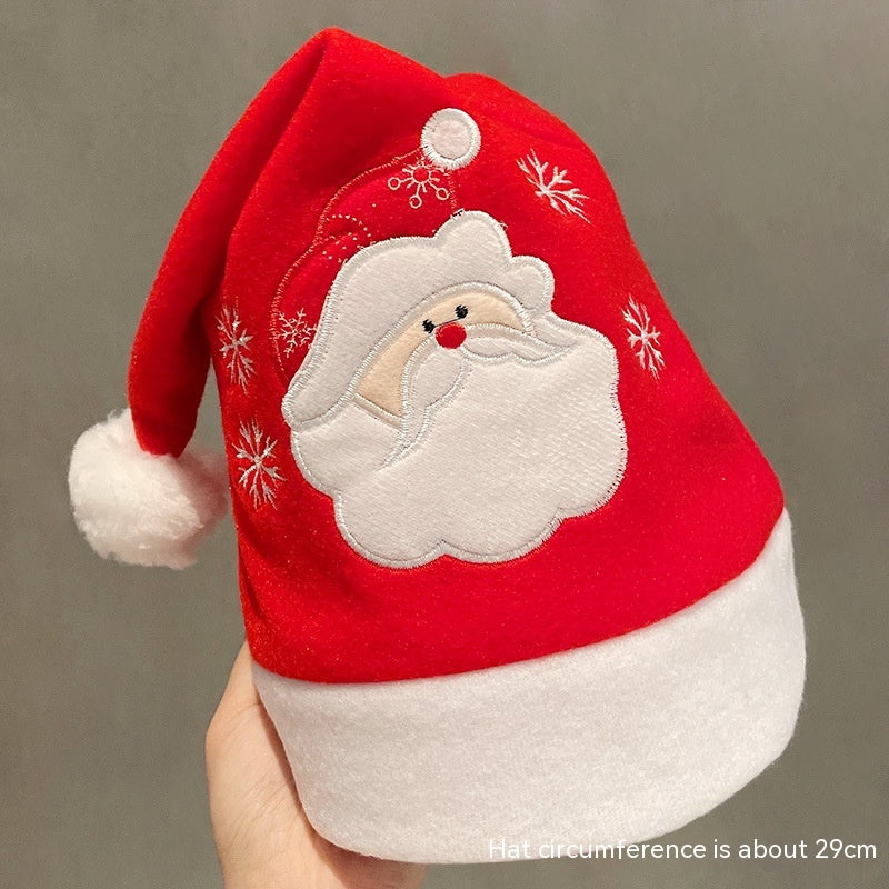 Sjov julehue i plys med festlige designs