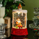 Vannfylt julescene med lys i stearinlysstil