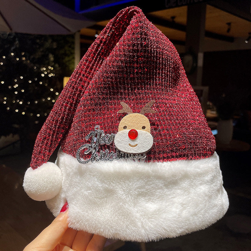 Sjov julehue i plys med festlige designs