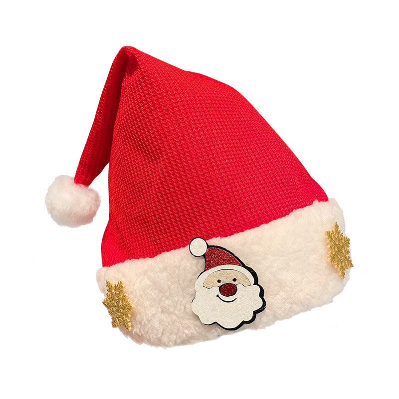 Sjov julehue i plys med festlige designs